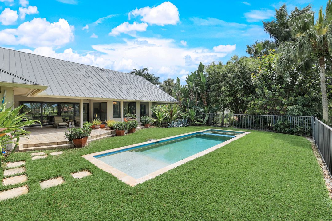 12975 Bald Cypress Ln, Naples, FL 34119