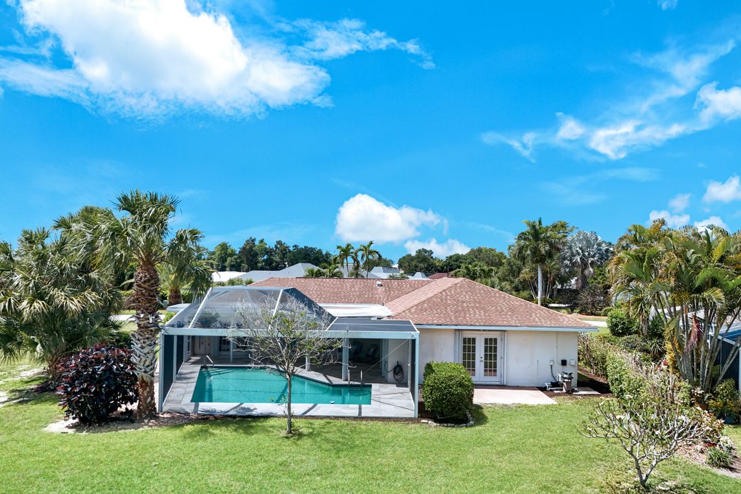 169 Baltusrol Dr, Naples, FL 34113