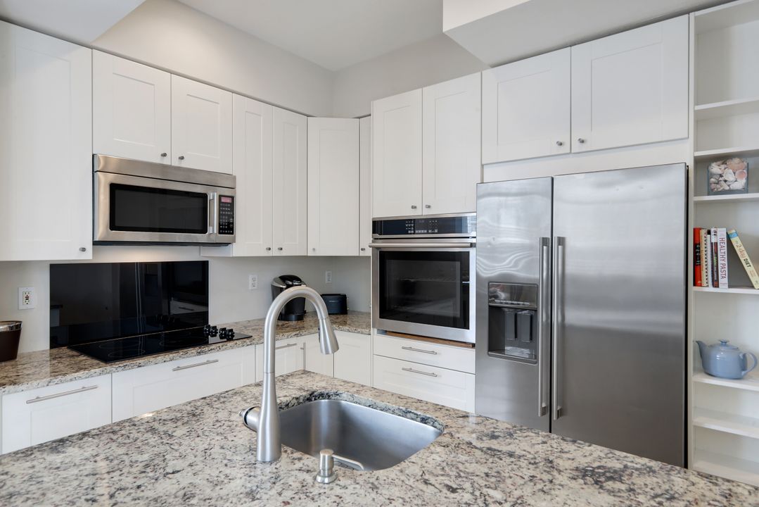 15040 Sterling Oaks Dr, Naples, FL 34110