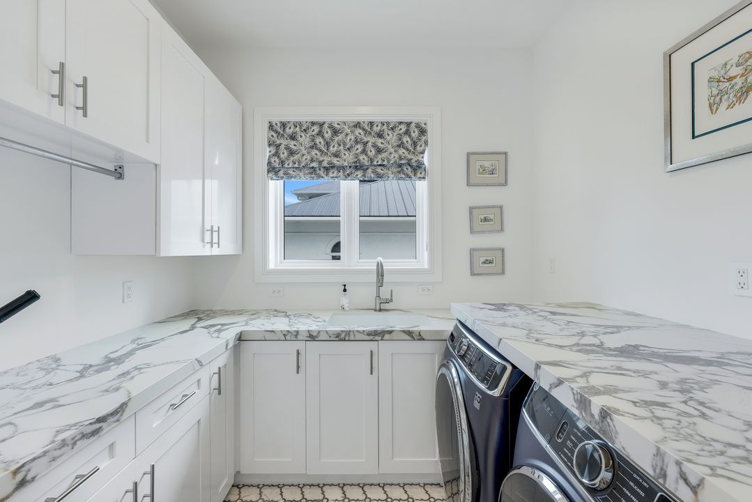 309 Neapolitan Way, Naples, FL 34103