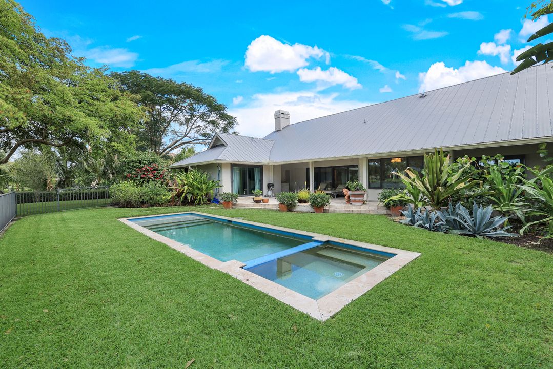 12975 Bald Cypress Ln, Naples, FL 34119