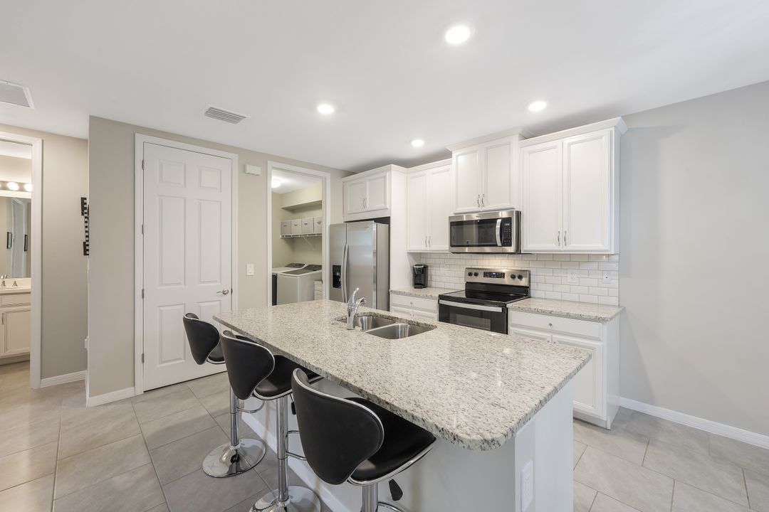 14551 Edgewater Cir, Naples, FL 34114