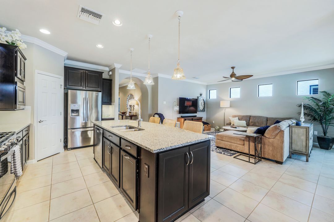 7408 Winding Cypress Dr, Naples, FL 34114