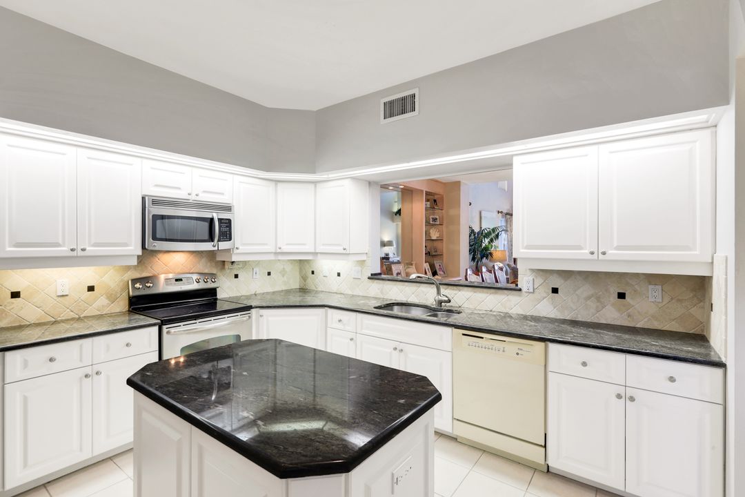 11822 Quail Village Way, Naples, FL 34119