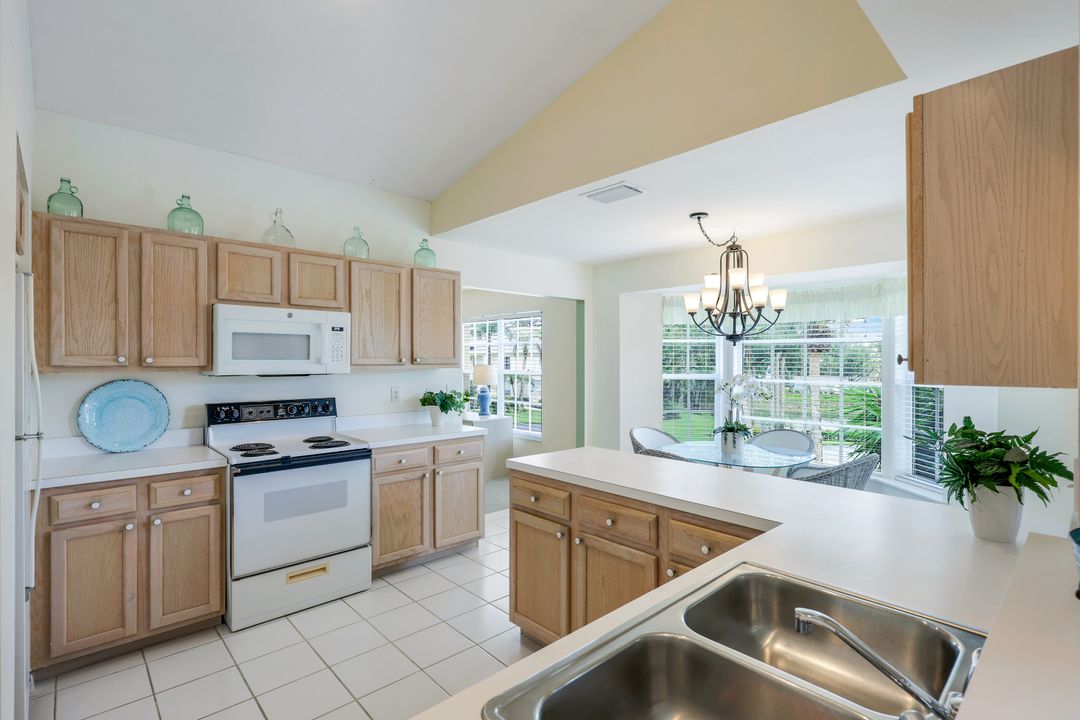 736 Wiggins Lake Dr #201, Naples, FL 34110