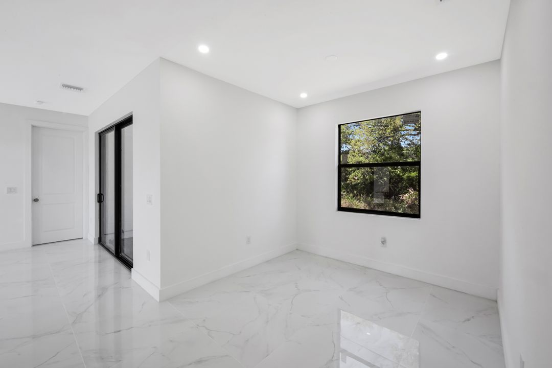 100 Parish Dr, Lehigh Acres, FL 33974