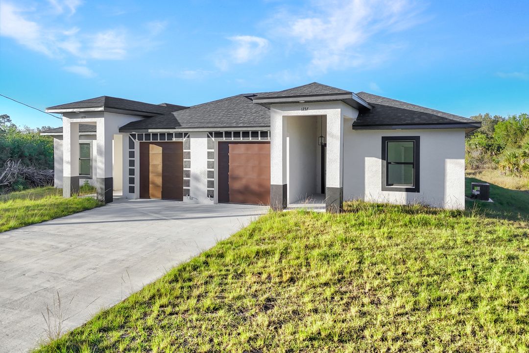 1237 Hillcrest St E, Lehigh Acres, FL 33974