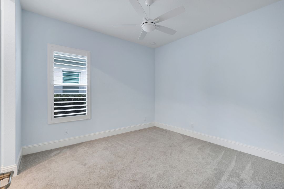 14386 Laguna Spgs Ln, Naples, FL 34114