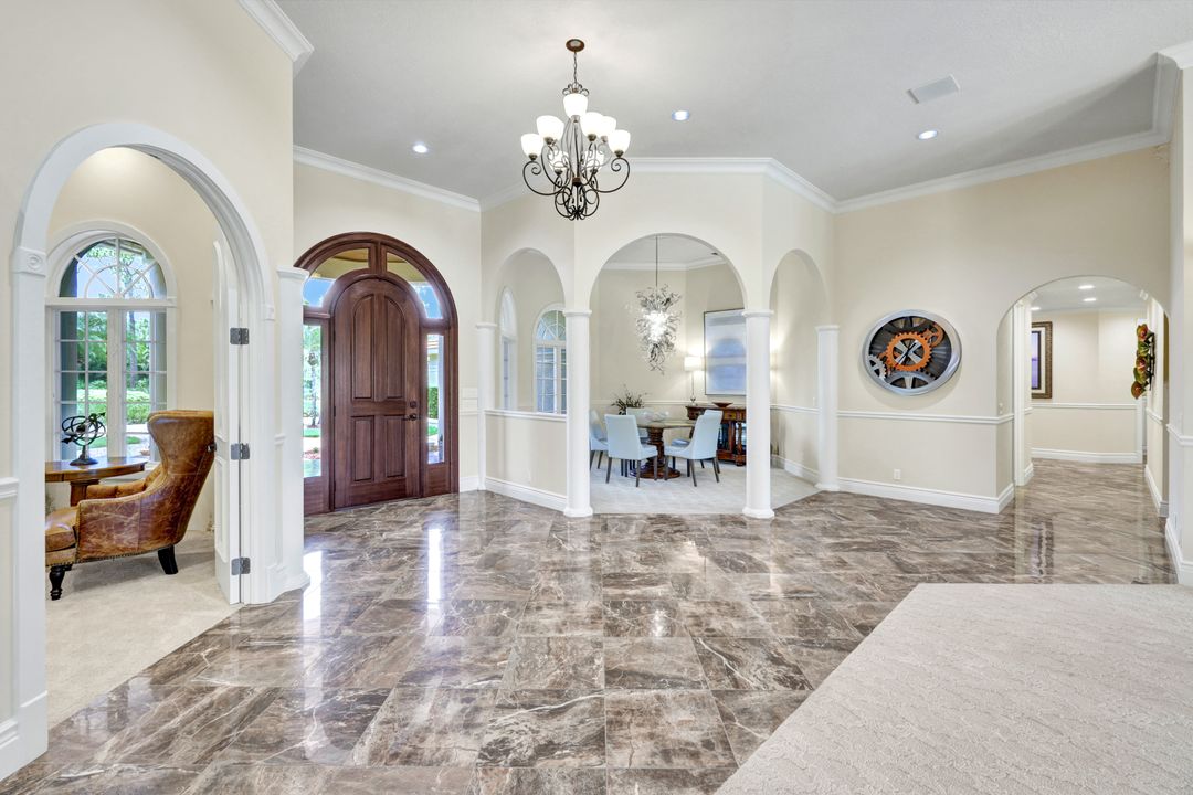 13488 Pond Apple Dr W, Naples, FL 34119