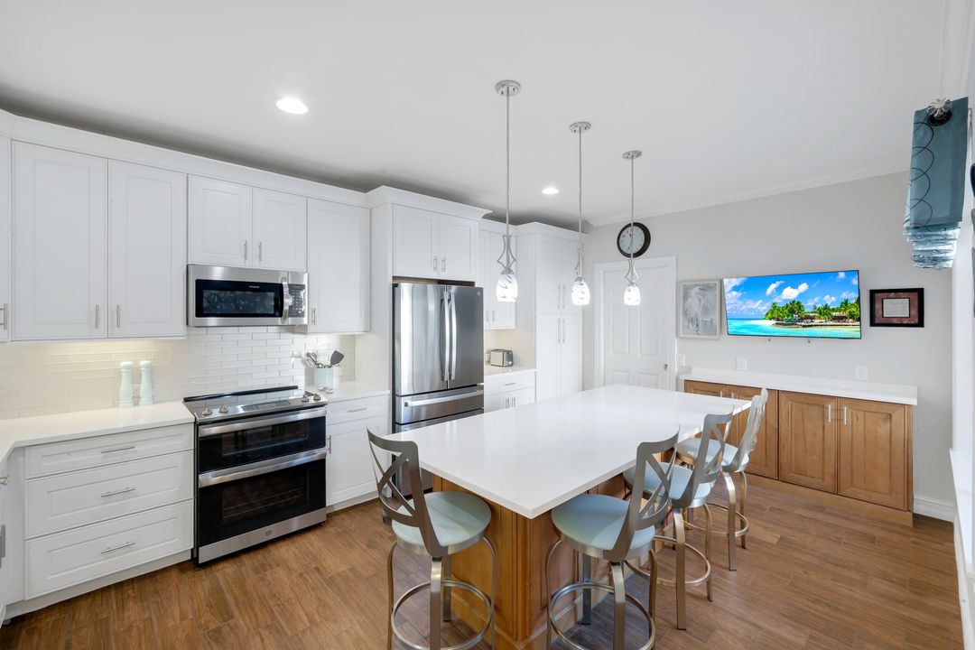 11426 Quail Village Way, Naples, FL 34119