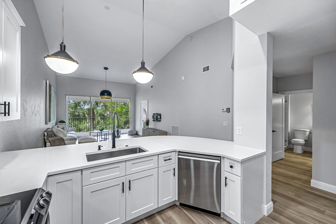 7741 Pebble Creek Cir #302, Naples, FL 34108