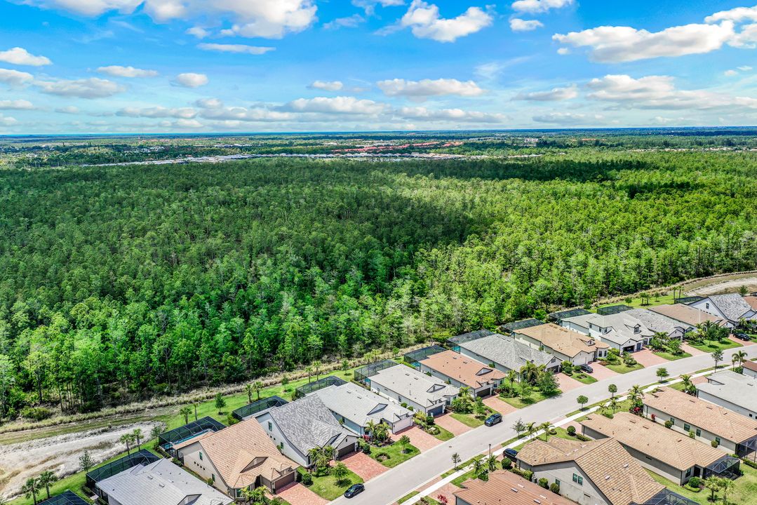 7692 Winding Cypress Dr, Naples, FL 34114