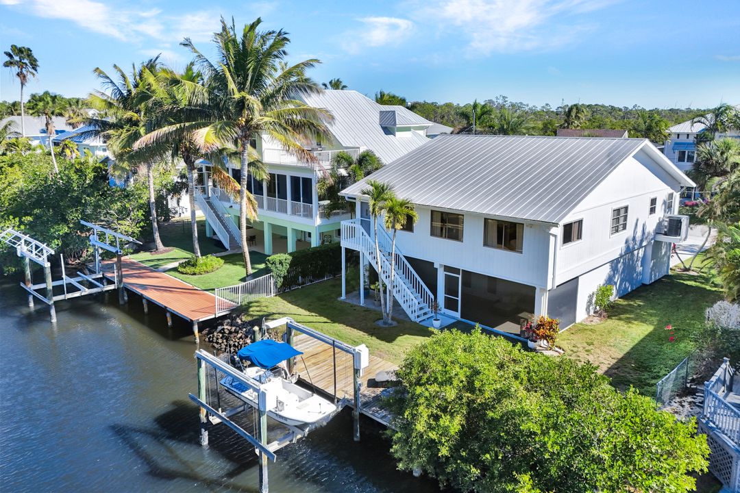 1285 Grand Canal Dr, Naples, FL 34110