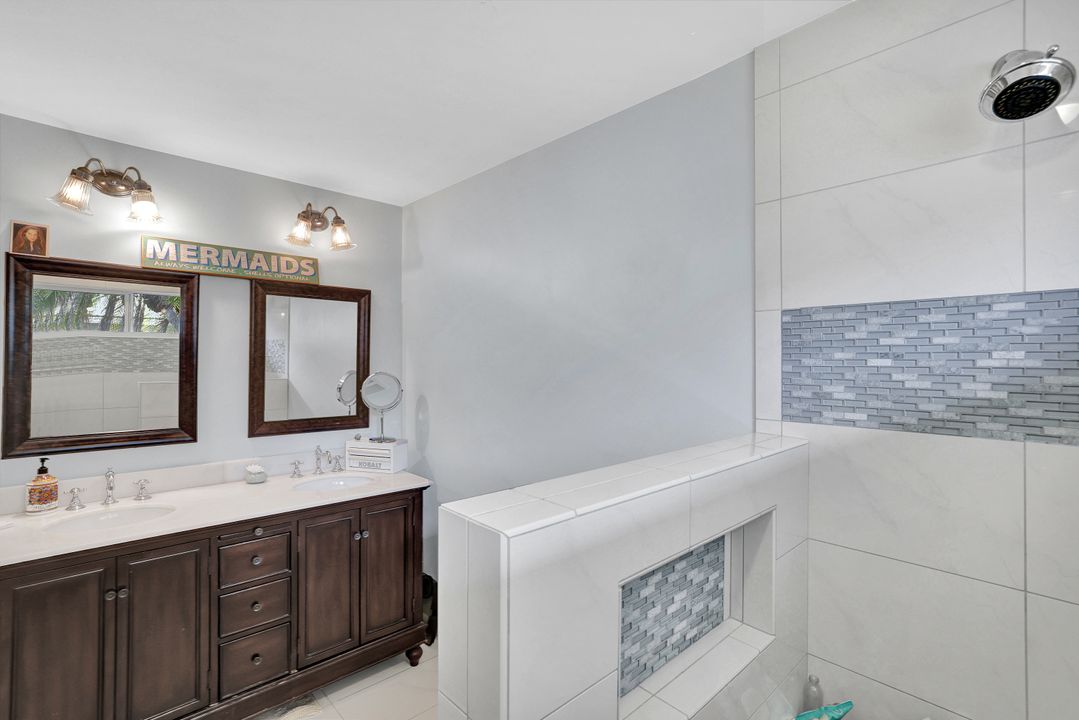 208 Baltusrol Dr, Naples, FL 34113