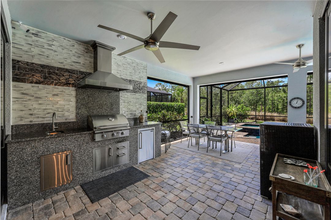 7692 Winding Cypress Dr, Naples, FL 34114