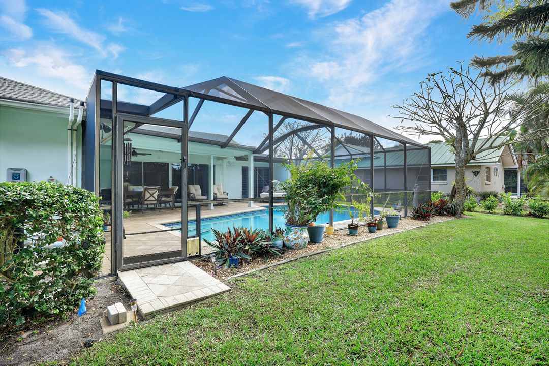 208 Baltusrol Dr, Naples, FL 34113