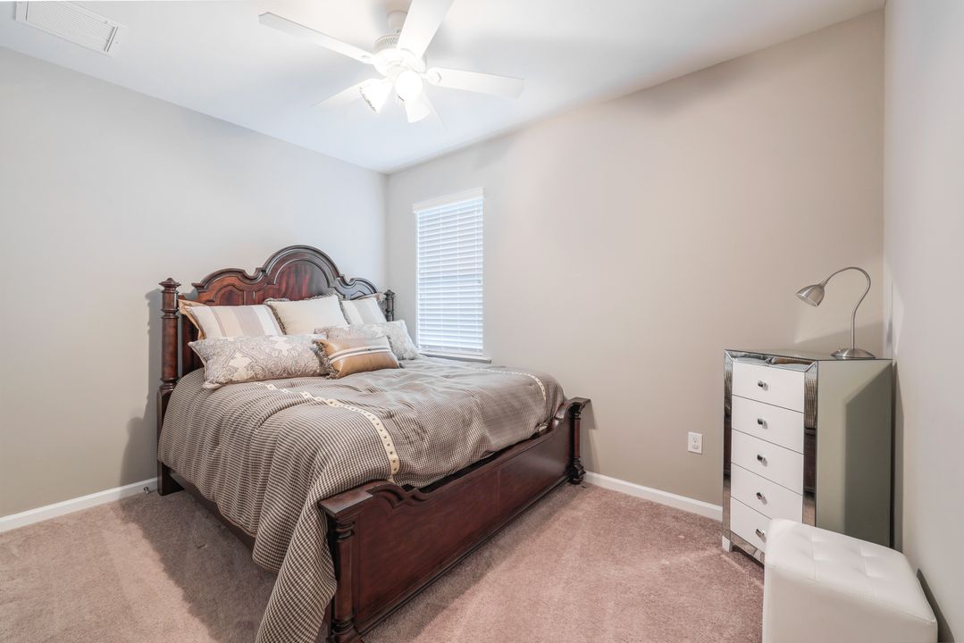 7408 Winding Cypress Dr, Naples, FL 34114