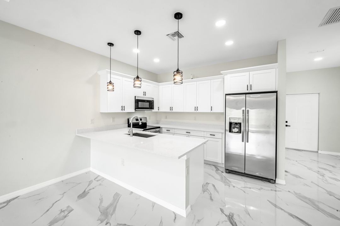 1235 Hillcrest St E, Lehigh Acres, FL 33974