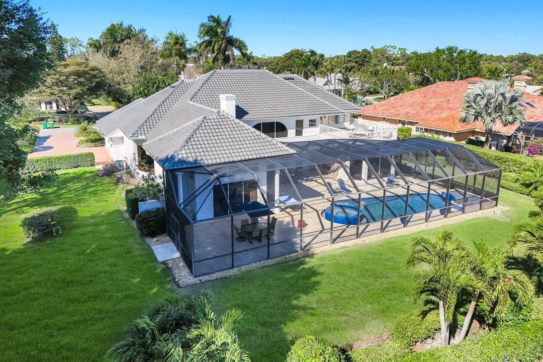 12924 Bald Cypress Ln, Naples, FL 34119