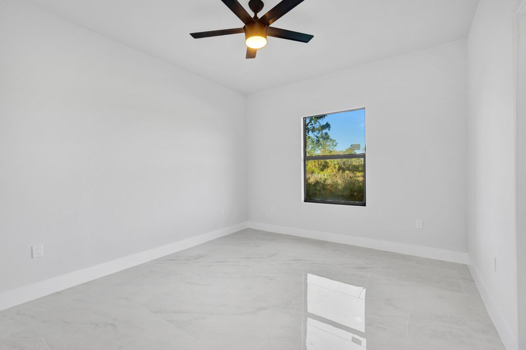 1222 Hilliard St E, Lehigh Acres, FL 33974