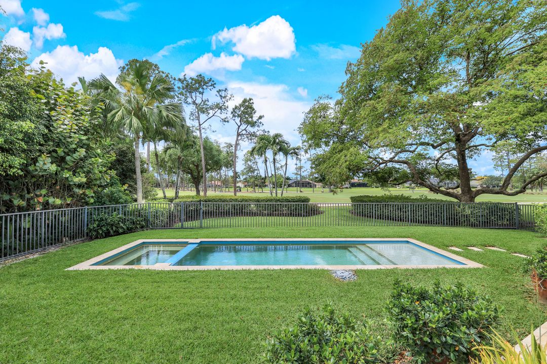 12975 Bald Cypress Ln, Naples, FL 34119