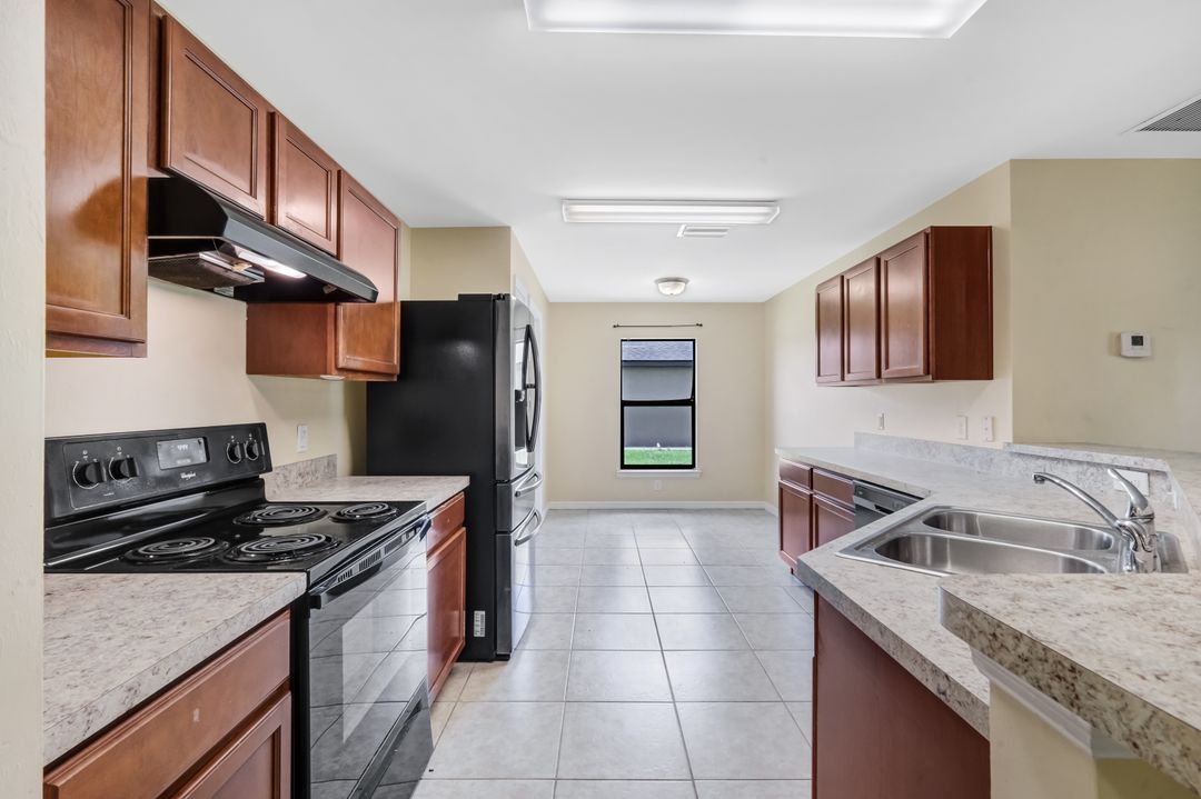 443 Shadow Lakes Dr, Lehigh Acres, FL 33974