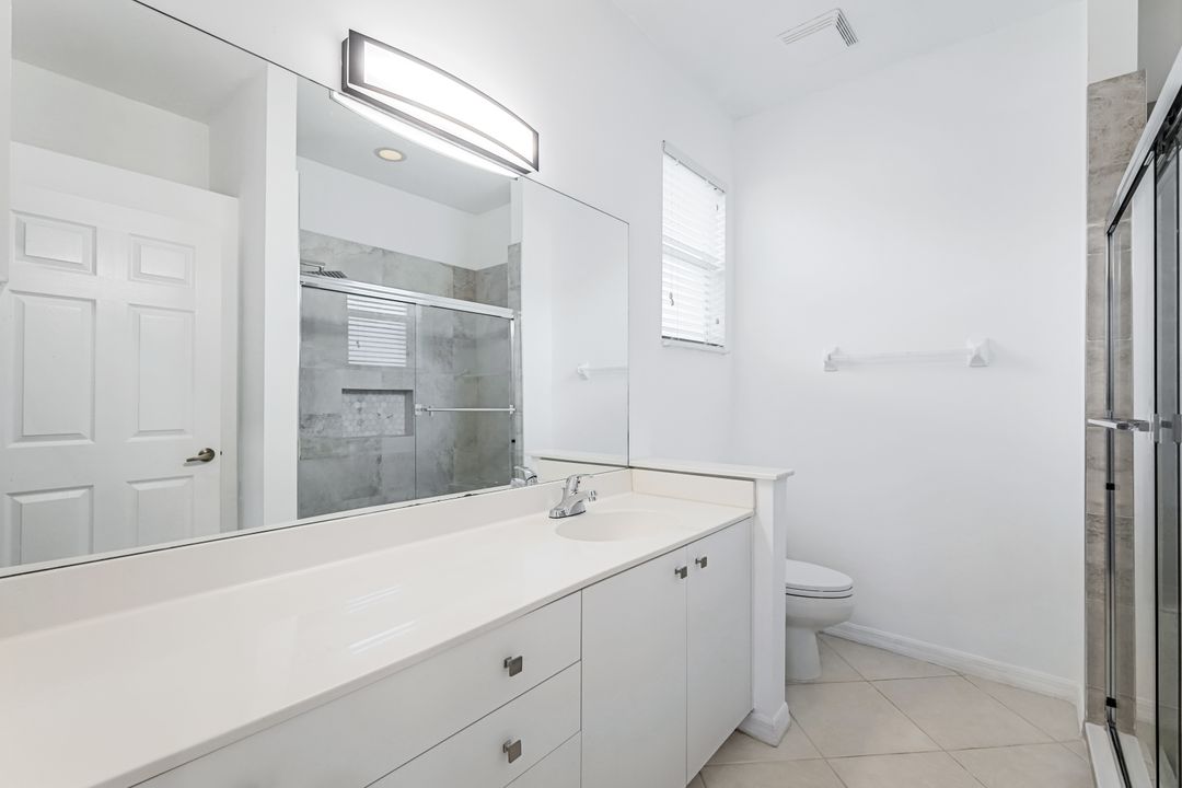 7488 Berkshire Pines Dr, Naples, FL 34104