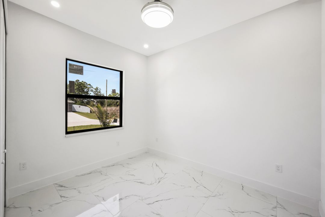 521 Lillon Ave S, Lehigh Acres, FL 33974