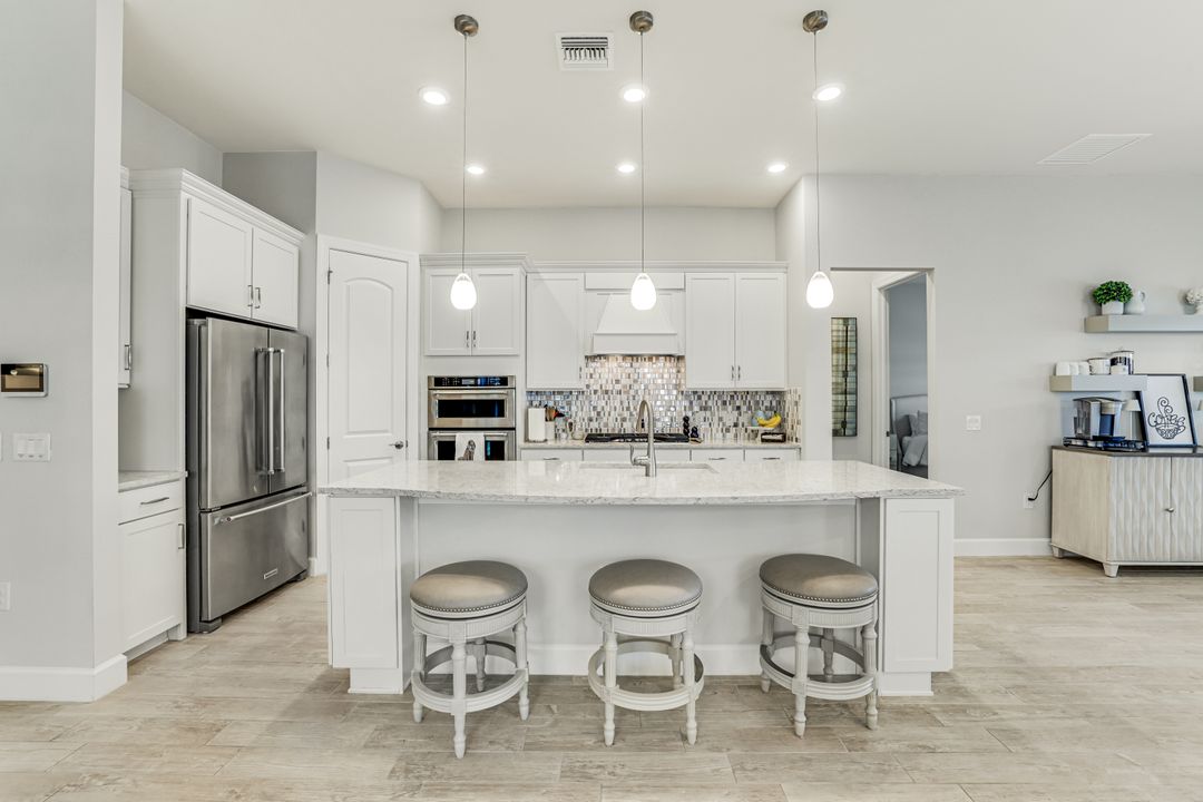 7631 Winding Cypress Dr, Naples, FL 34114