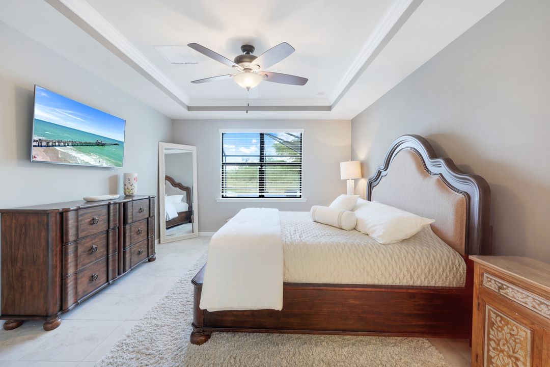 7408 Winding Cypress Dr, Naples, FL 34114