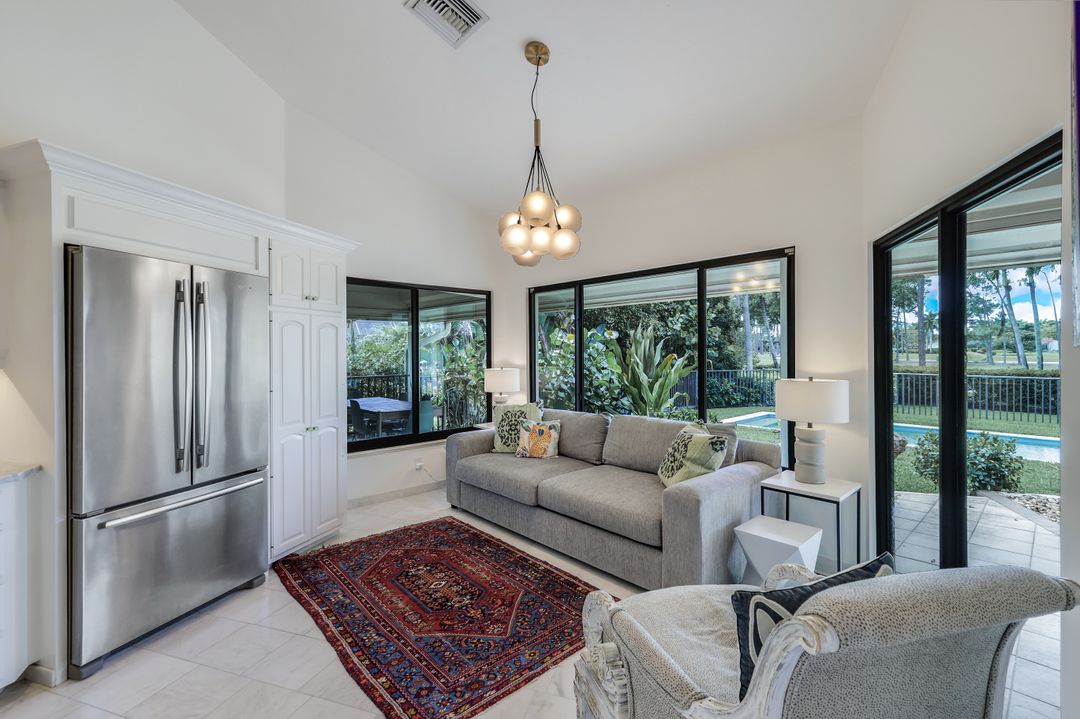 12975 Bald Cypress Ln, Naples, FL 34119