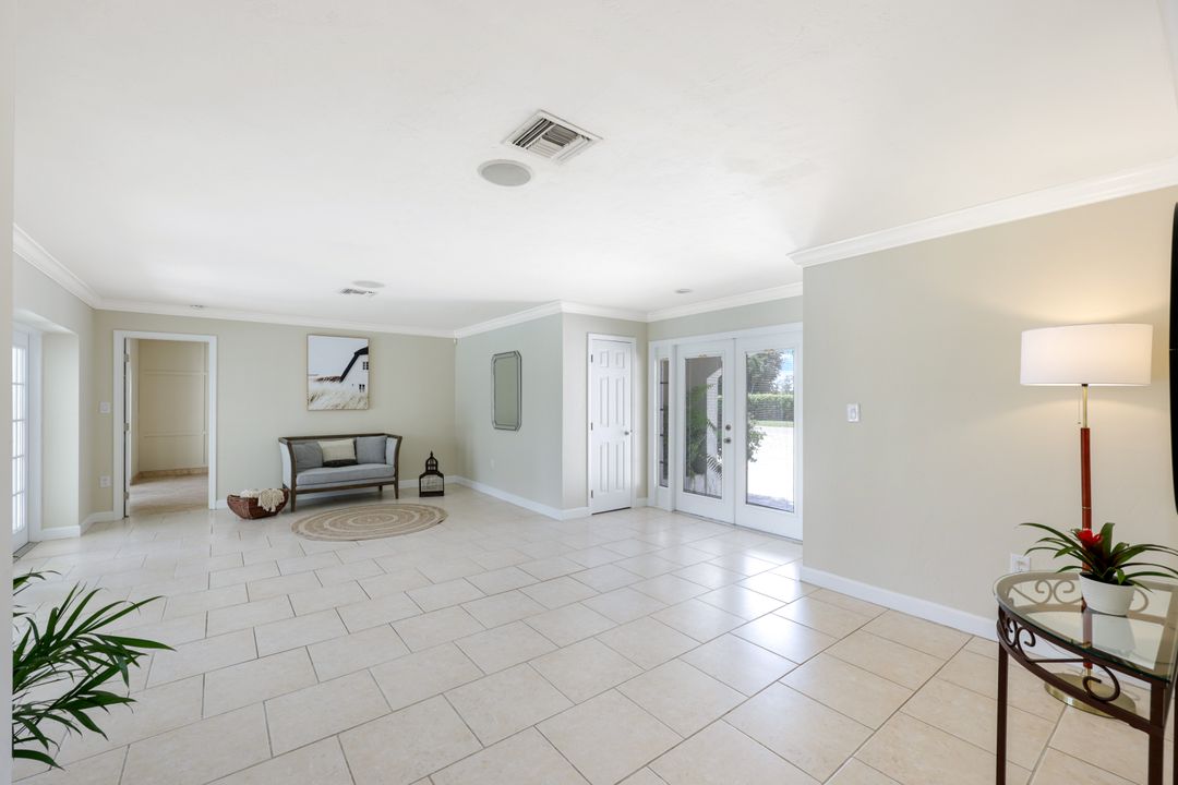 169 Baltusrol Dr, Naples, FL 34113