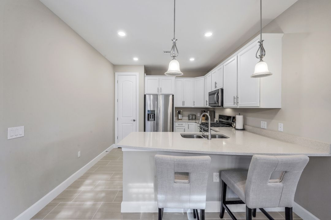 7790 Jacaranda Ln, Naples, FL 34114