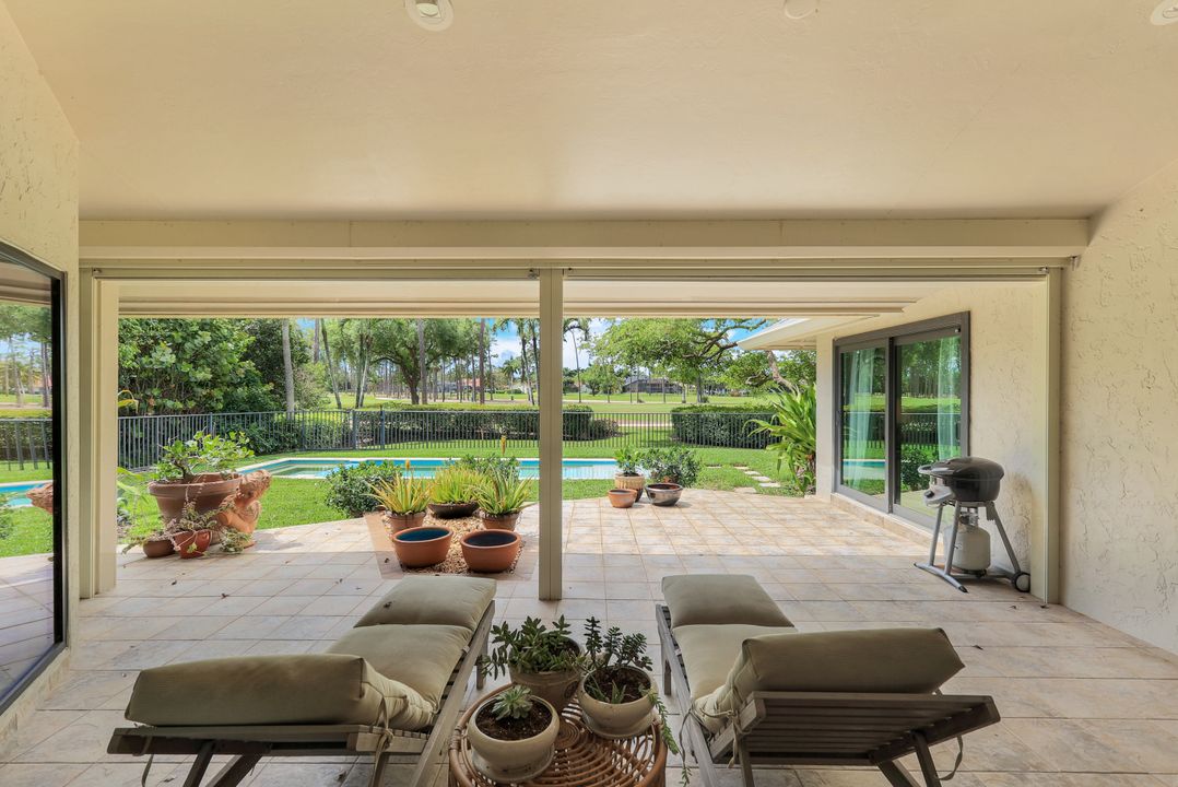 12975 Bald Cypress Ln, Naples, FL 34119