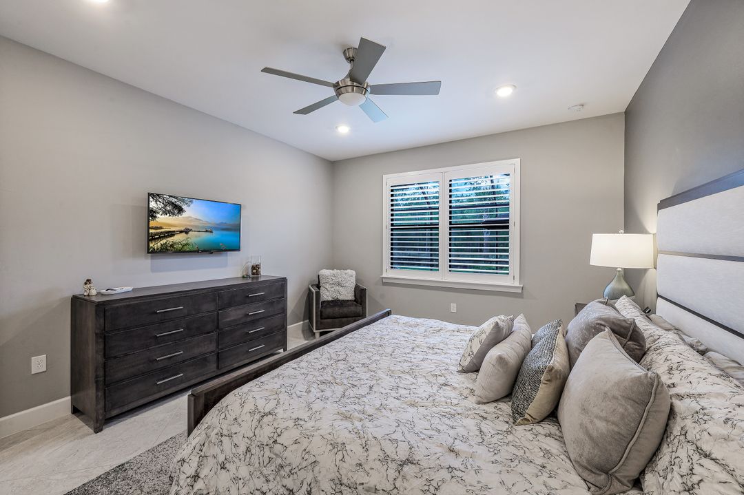 7692 Winding Cypress Dr, Naples, FL 34114
