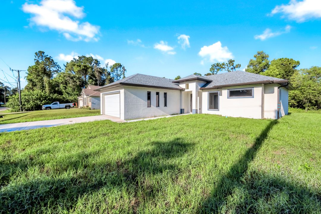1133 Alvin Ave, Lehigh Acres, FL 33971