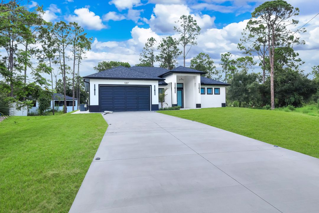 1207 Ramus St E, Lehigh Acres, FL 33974