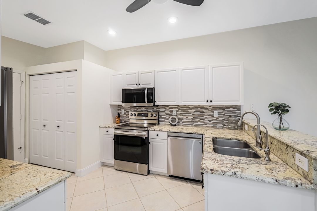 7488 Berkshire Pines Dr, Naples, FL 34104