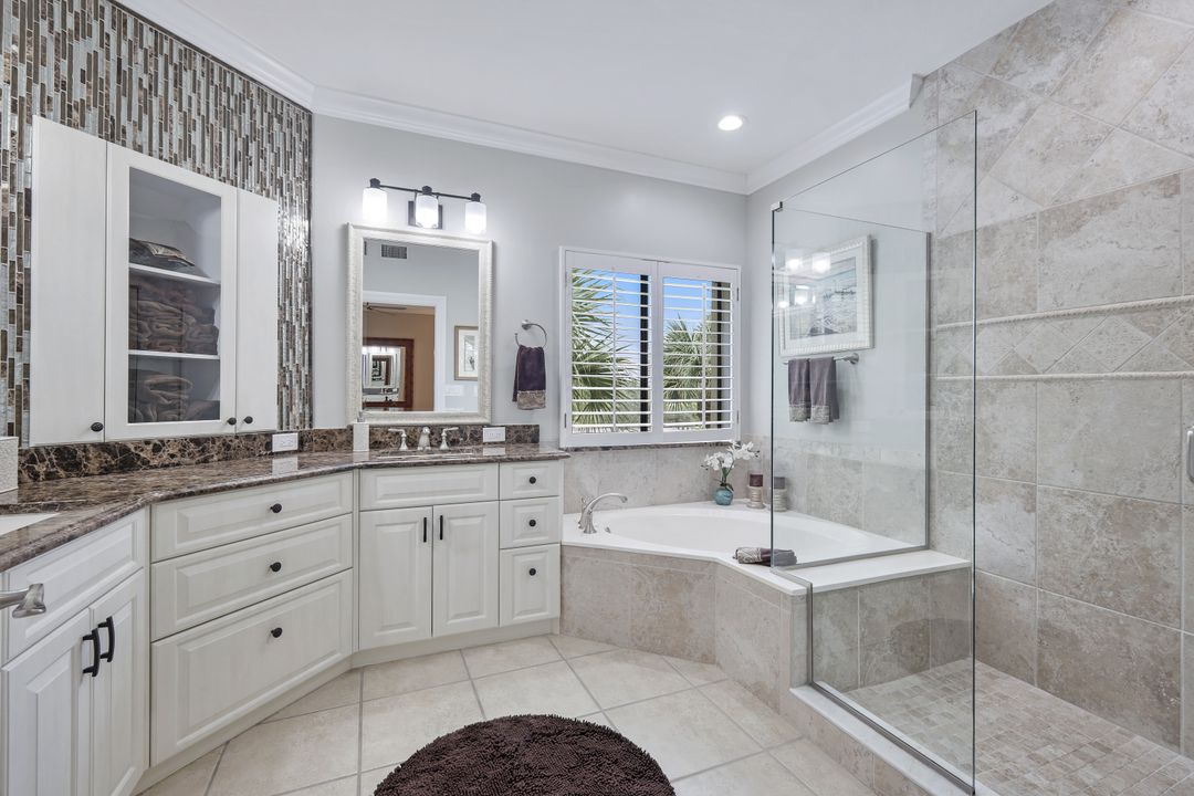 7048 Pelican Bay Blvd #305, Naples, FL 34108