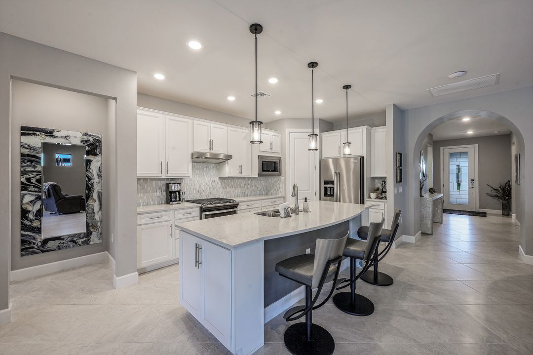 7692 Winding Cypress Dr, Naples, FL 34114
