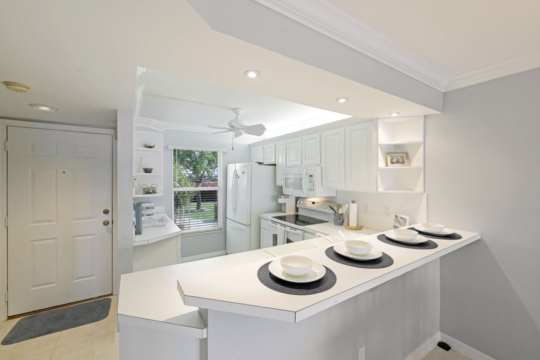 1045 Mainsail Dr #402, Naples, FL 34114