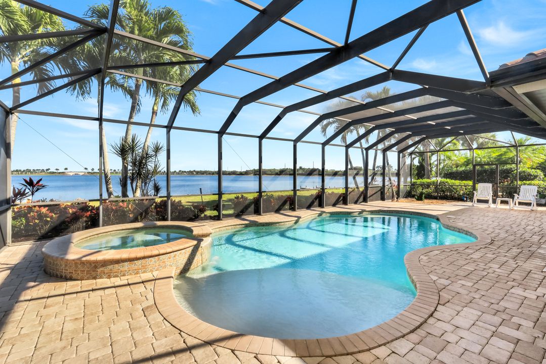 8765 Hideaway Harbor Ct, Naples, FL 34120