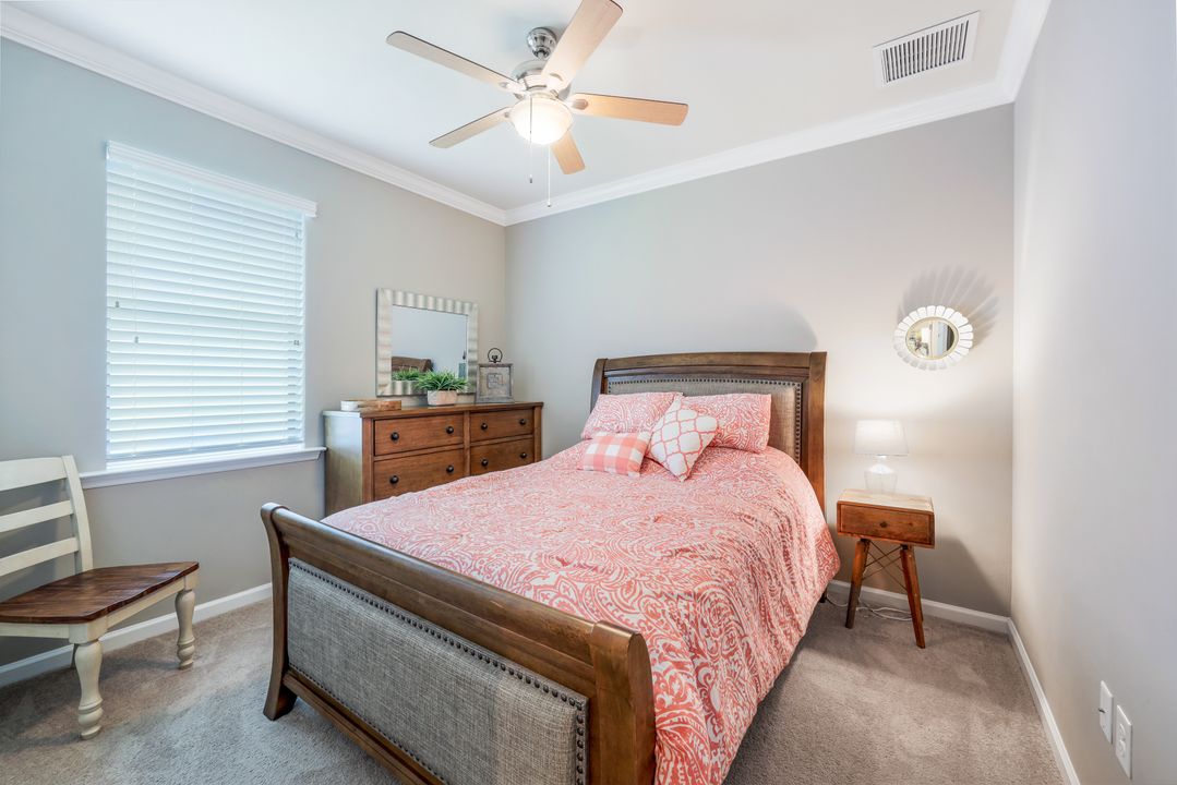 7408 Winding Cypress Dr, Naples, FL 34114