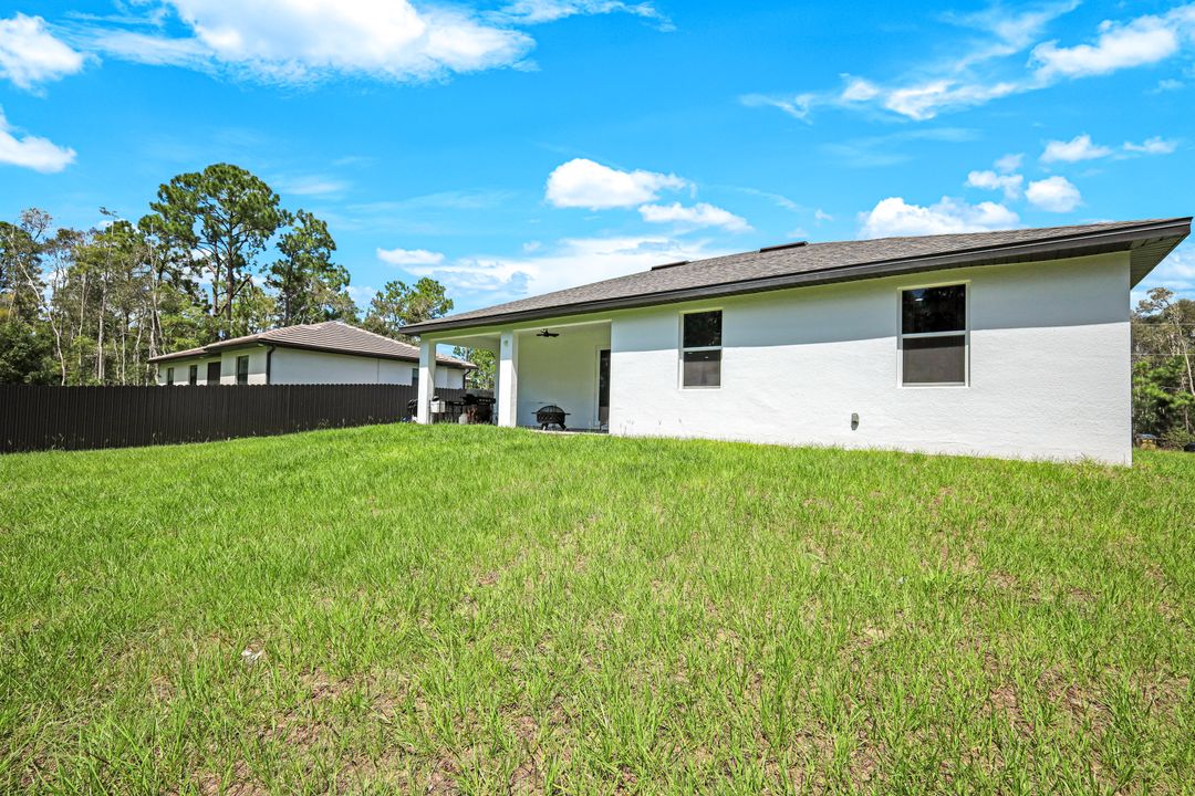 506 Rogue St, Lehigh Acres, FL 33974