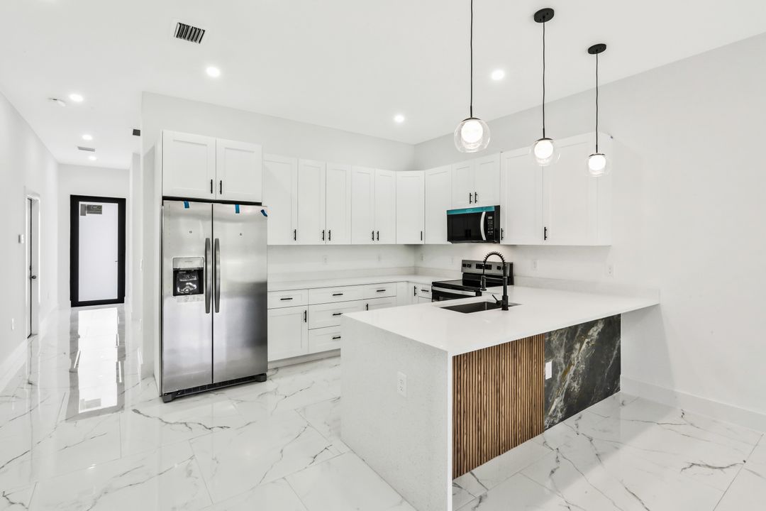 521 Lillon Ave S, Lehigh Acres, FL 33974