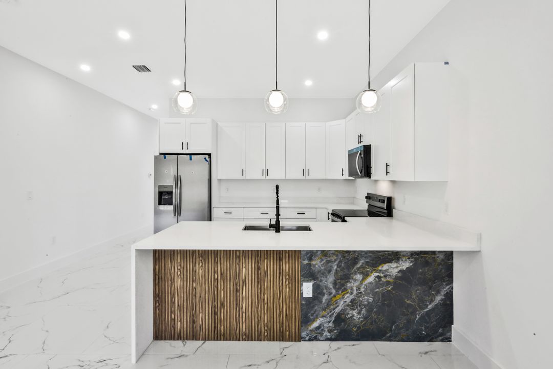 521 Lillon Ave S, Lehigh Acres, FL 33974