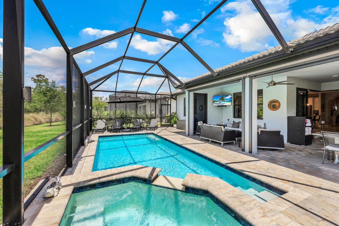 7692 Winding Cypress Dr, Naples, FL 34114