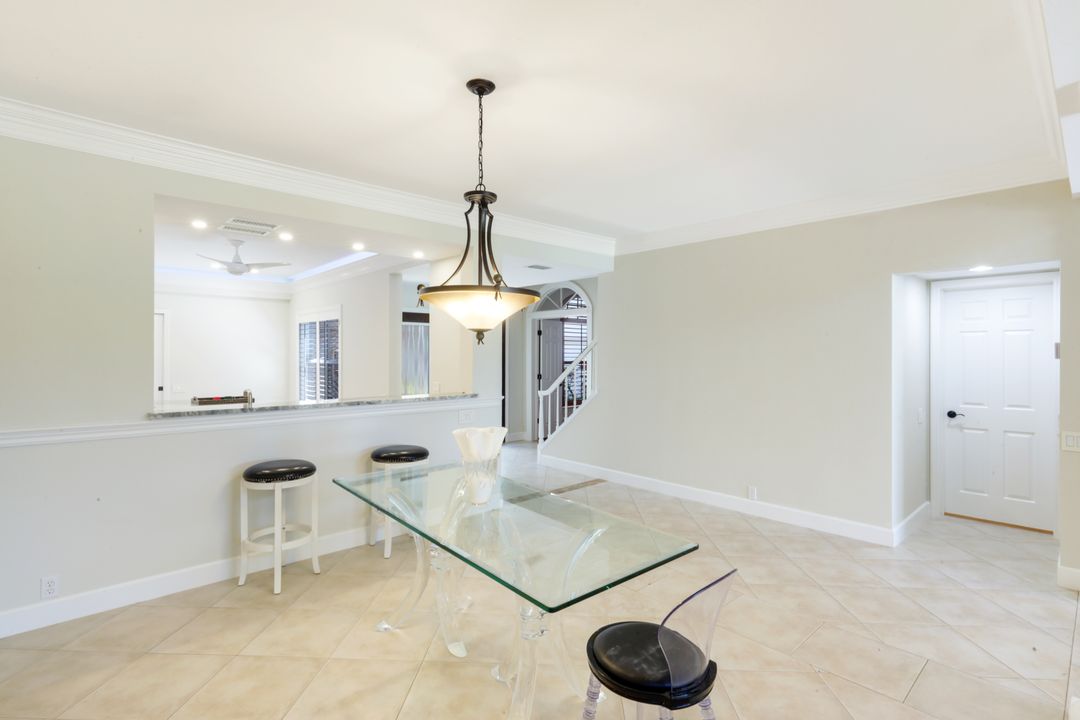 11676 Quail Village Way, Naples, FL 34119
