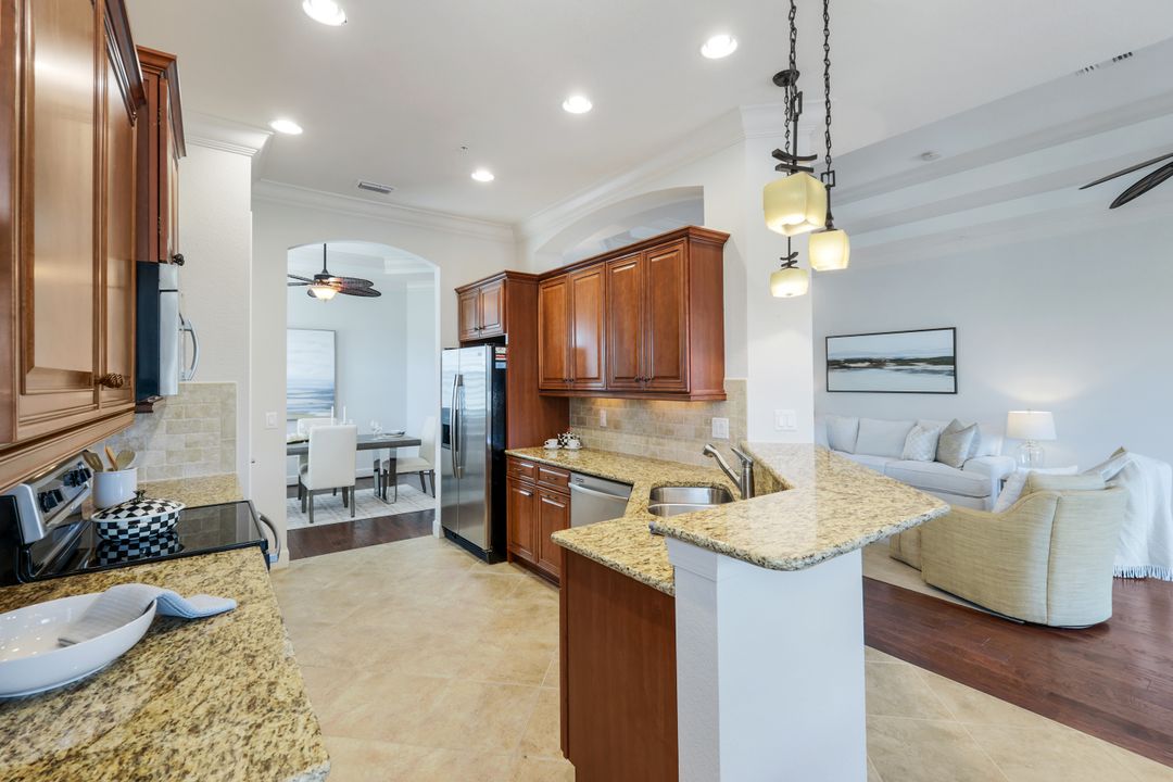 9557 Ironstone Terrace #202, Naples, FL 34120