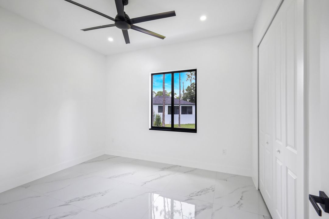 1207 Ramus St E, Lehigh Acres, FL 33974